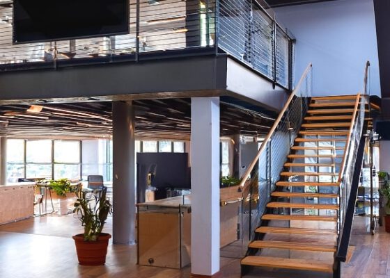 Staircase leading up to a mezzanine floor
